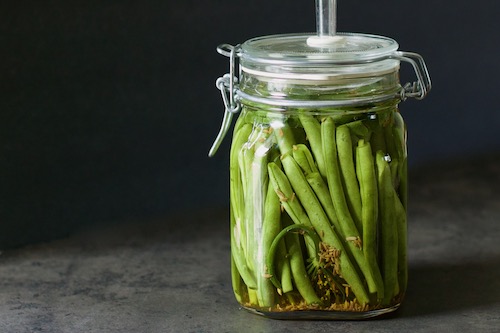 Lacto-fermented green beans in airlock jar
